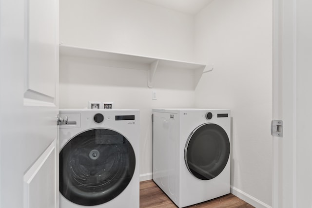 6018 Vespucci Ave, Bakersfield, CA 93313 - laundry room with separate washer and dryer, light wood finished floors, and baseboards