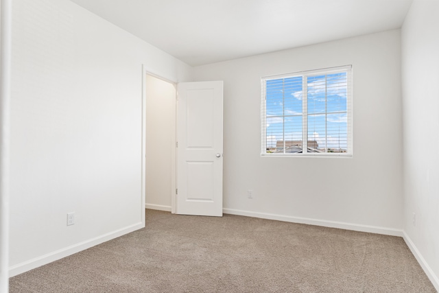 6018 Vespucci Ave, Bakersfield, CA 93313 - unfurnished room featuring carpet floors and baseboards