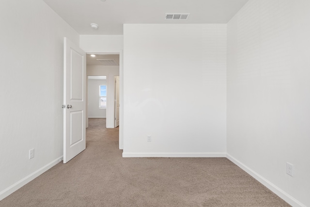 6018 Vespucci Ave, Bakersfield, CA 93313 - carpeted spare room featuring baseboards and a smoke detector