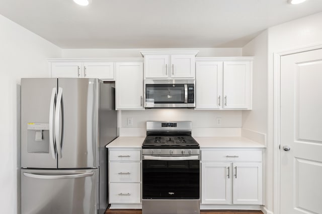 6018 Vespucci Ave, Bakersfield, CA 93313 - kitchen with appliances with stainless steel finishes, white cabinetry, and light countertops