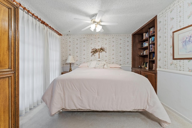 2600 Aland St, Lancaster, CA 93536 - bedroom with wallpapered walls, a textured ceiling, and ceiling fan