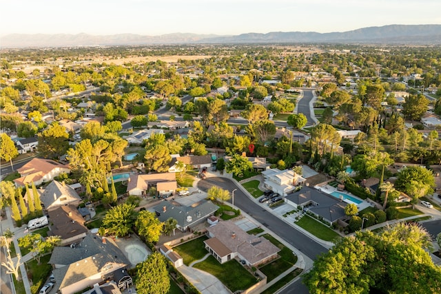 2600 Aland St, Lancaster, CA 93536 - aerial overview of property's location with mountains and nearby suburban area