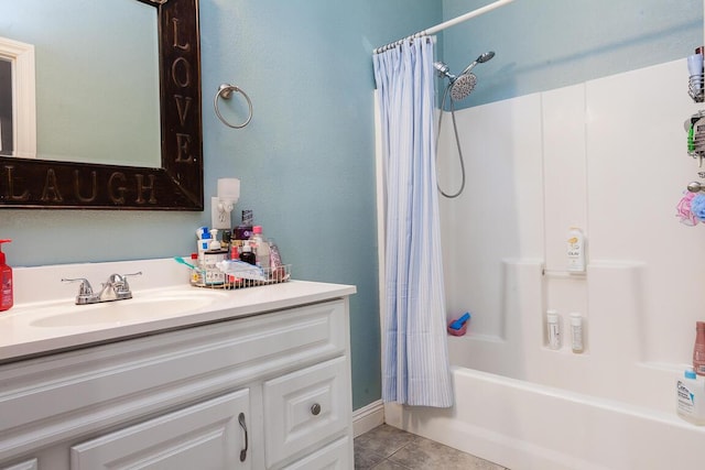 bathroom with shower / tub combo, vanity, and tile patterned floors