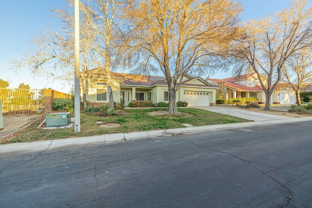 single story home with a garage and a front yard