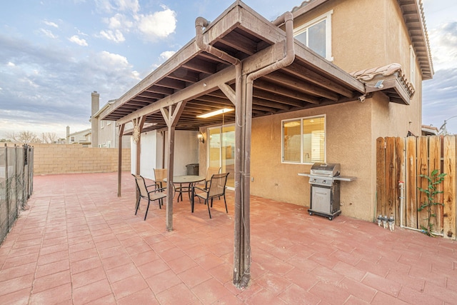 view of patio / terrace featuring area for grilling and a fenced backyard