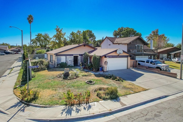 front facade with a front yard and a garage