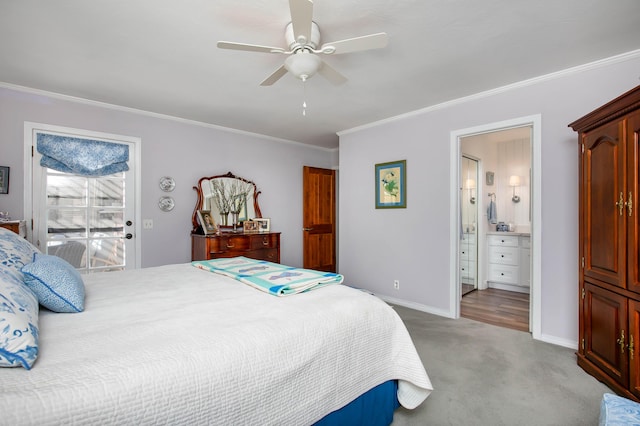 carpeted bedroom featuring crown molding, ensuite bath, and ceiling fan