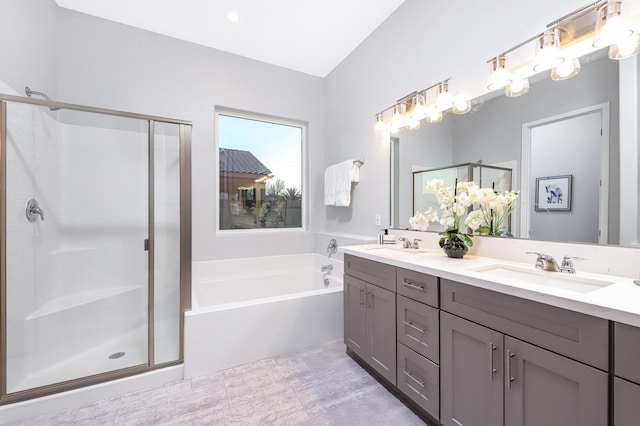 40127 Pevero Ct, Palmdale, CA 93551 - full bath with double vanity, a garden tub, and a stall shower