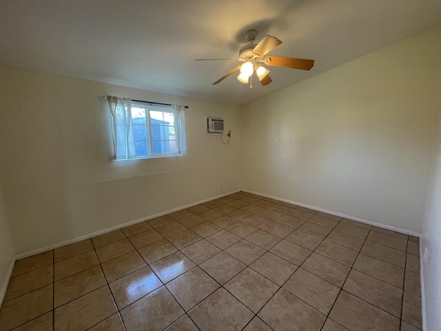 2010 W Lumber St, Lancaster, CA 93536 - empty room with light tile patterned floors, a ceiling fan, an AC wall unit, and baseboards