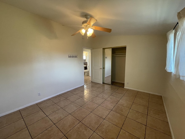 2010 W Lumber St, Lancaster, CA 93536 - unfurnished bedroom featuring light tile patterned floors, baseboards, and a closet