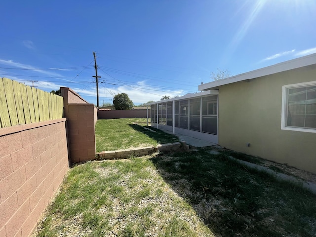 2010 W Lumber St, Lancaster, CA 93536 - view of yard with a sunroom