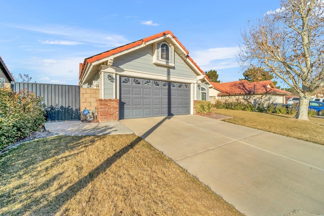 exterior space featuring a yard and a garage