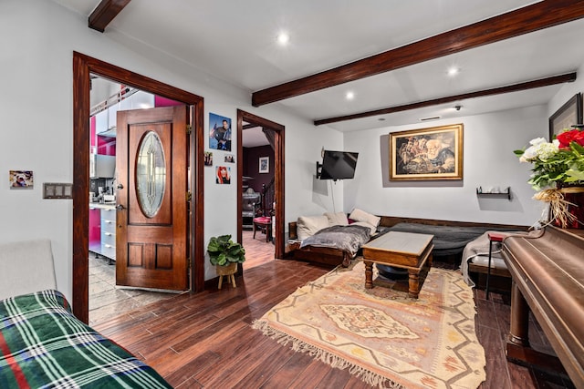 living room featuring beam ceiling