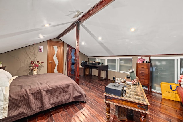 bedroom featuring hardwood / wood-style floors and lofted ceiling