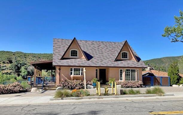 view of front of home with a mountain view