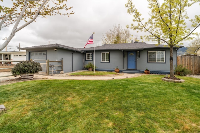 206 Brentwood Dr, Tehachapi, CA 93561 - single story home with a front lawn, a garage, stucco siding, and fence