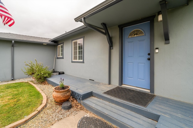 206 Brentwood Dr, Tehachapi, CA 93561 - doorway to property featuring stucco siding