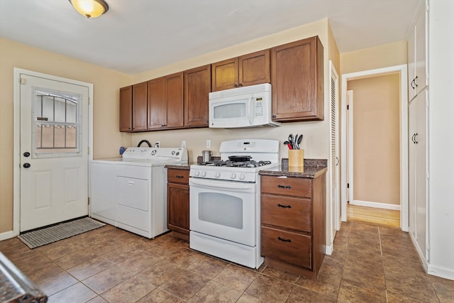 206 Brentwood Dr, Tehachapi, CA 93561 - kitchen featuring brown cabinets, white appliances, washer and dryer, and baseboards