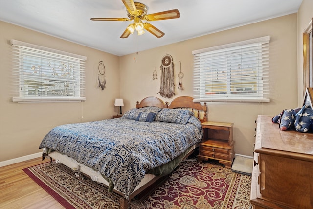 206 Brentwood Dr, Tehachapi, CA 93561 - bedroom with wood finished floors, ceiling fan, and baseboards