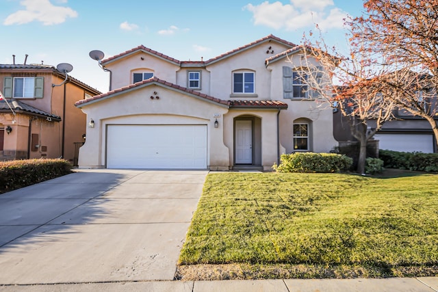 mediterranean / spanish-style house featuring a front lawn and a garage