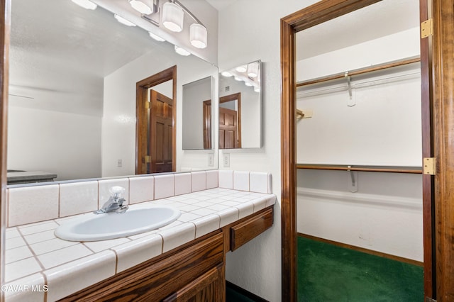 2613 W W Ave K4, Lancaster, CA 93536 - bathroom with vanity and a spacious closet