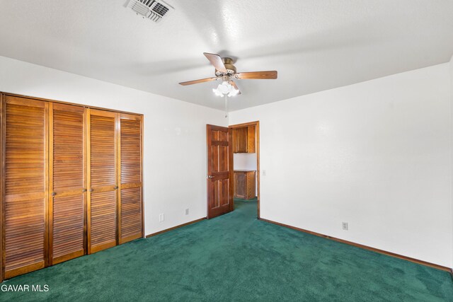 2613 W W Ave K4, Lancaster, CA 93536 - unfurnished bedroom with carpet, a closet, and ceiling fan