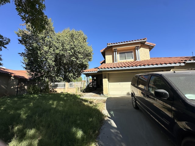 exterior space featuring a yard and a garage