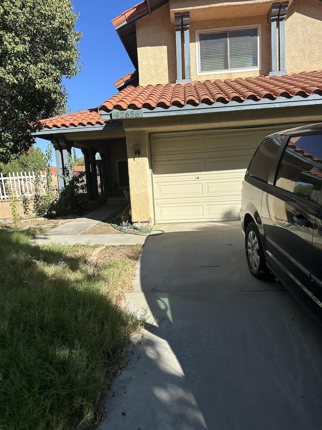 view of front of home featuring a garage