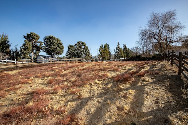 exterior space with a rural view