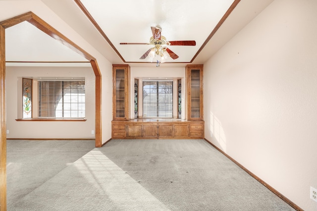 unfurnished room featuring ceiling fan and light colored carpet