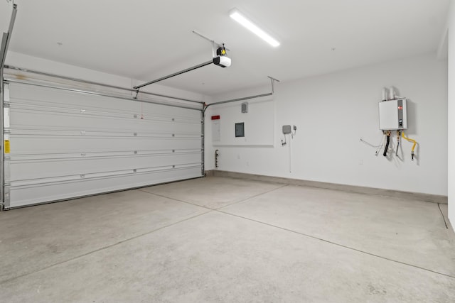 garage with a garage door opener and baseboards