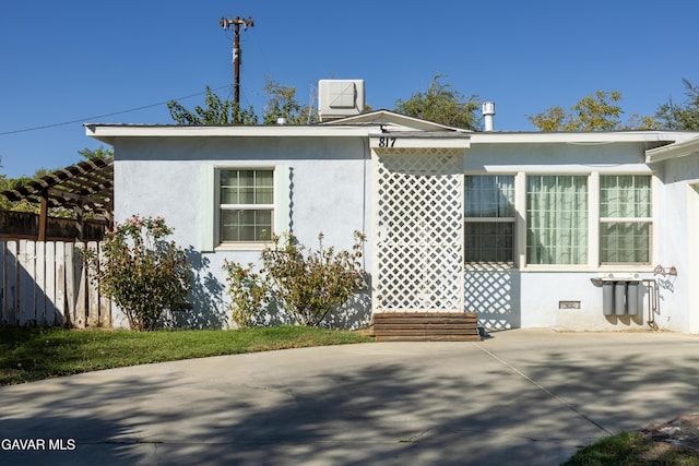 817 W J6, Lancaster, CA 93534 - view of front of house with stucco siding and a patio area