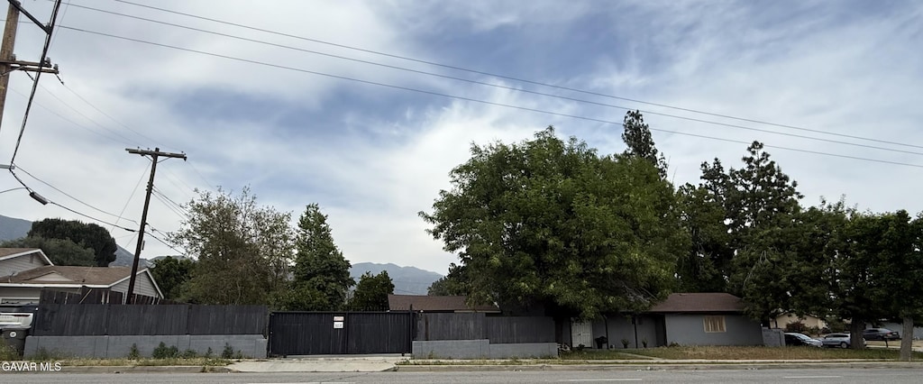 15245 Monte St, Sylmar, CA 91342 - view of front of house featuring a fenced front yard and a gate