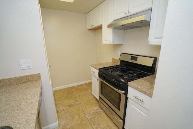 28093 Robin Ave Unit 150, Santa Clarita, CA 91350 - kitchen with stainless steel gas range oven, under cabinet range hood, white cabinetry, light countertops, and baseboards