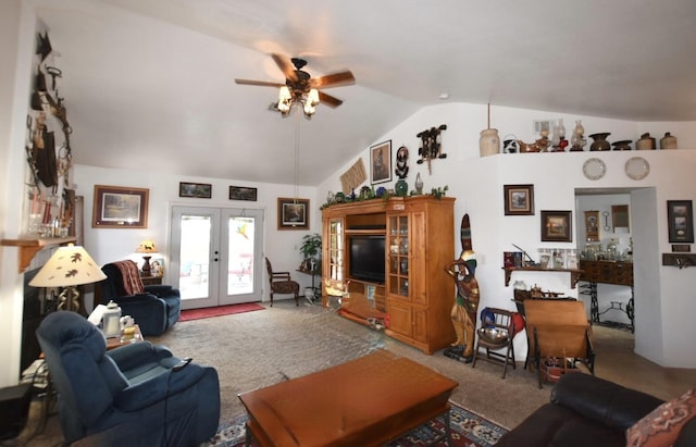 carpeted living area with vaulted ceiling, a ceiling fan, and french doors