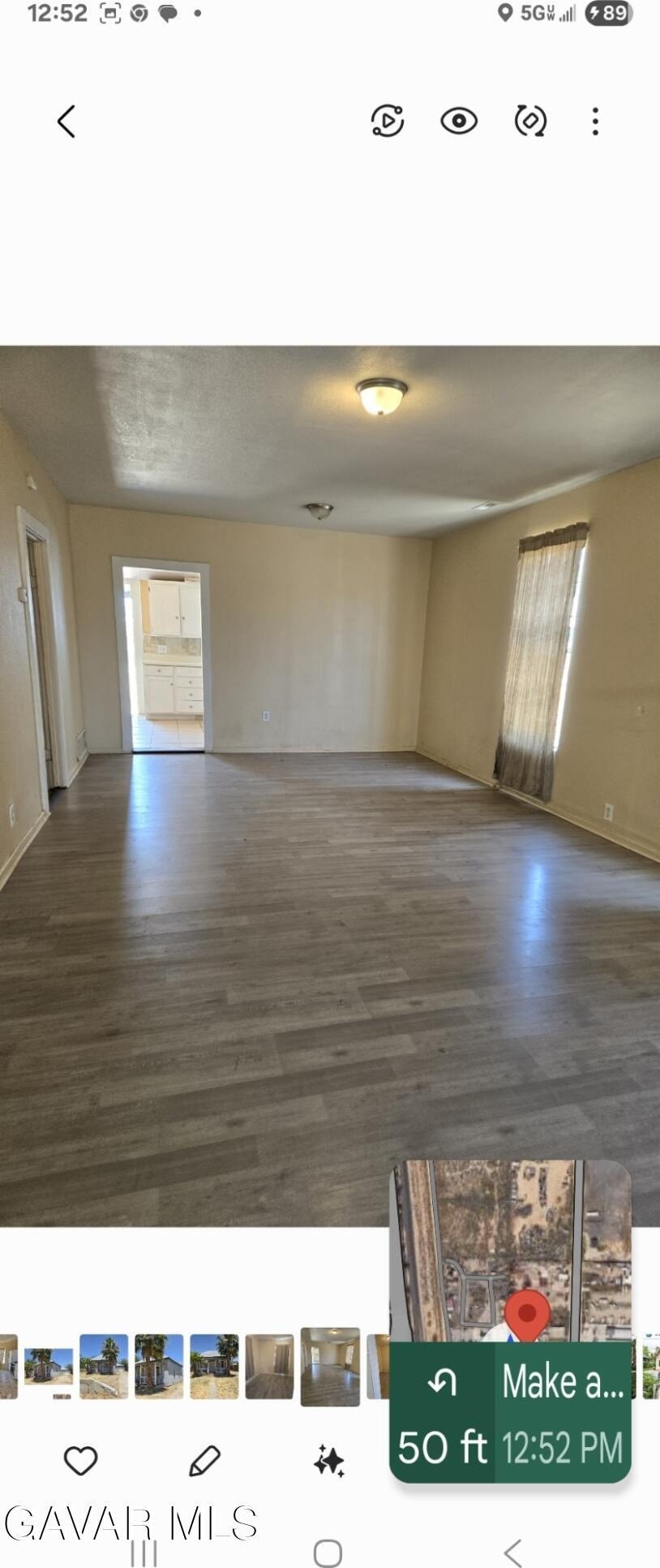 941 W Oldfield St, Lancaster, CA 93534 - unfurnished living room with wood finished floors and healthy amount of natural light