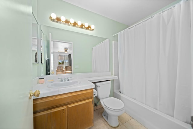 36933 Cadmia Ct, Palmdale, CA 93552 - bathroom with vanity, toilet, tile patterned flooring, shower / bath combination with curtain, and a ceiling fan