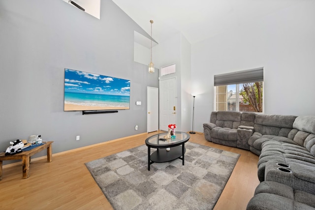 36933 Cadmia Ct, Palmdale, CA 93552 - living area featuring light wood-type flooring and high vaulted ceiling