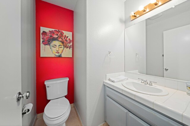 36933 Cadmia Ct, Palmdale, CA 93552 - bathroom with vanity, toilet, and tile patterned flooring