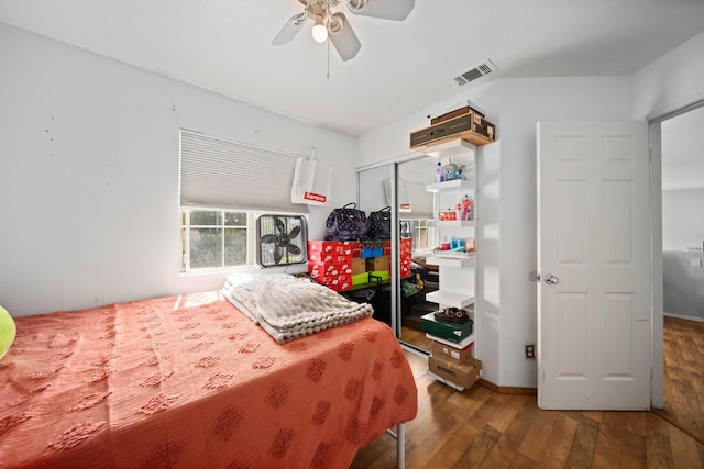 36933 Cadmia Ct, Palmdale, CA 93552 - bedroom with hardwood / wood-style floors, a closet, a ceiling fan, and baseboards