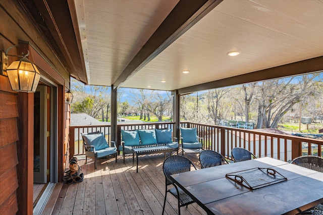 deck featuring outdoor dining space