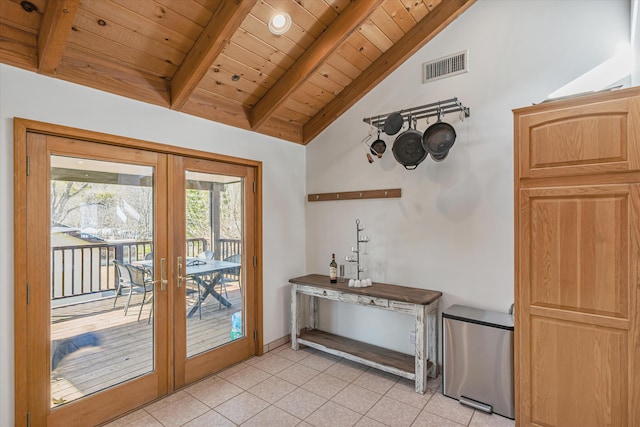 doorway featuring lofted ceiling with beams, light tile patterned floors, wood ceiling, visible vents, and french doors