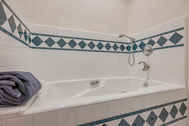 full bathroom with tiled tub and a shower