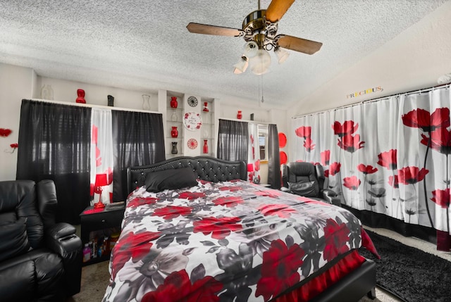 bedroom with carpet, a textured ceiling, ceiling fan, and lofted ceiling