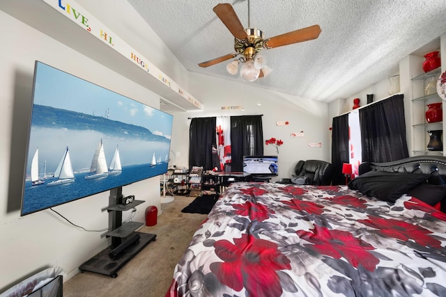 carpeted bedroom with a textured ceiling, ceiling fan, and vaulted ceiling