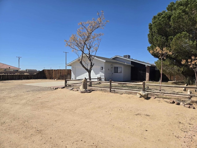 view of home's exterior with a garage