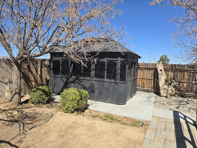 view of outbuilding with a fenced backyard