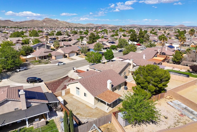 drone / aerial view with a residential view and a mountain view