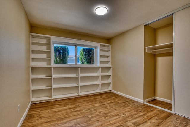 45209 Lorimer Ave, Lancaster, CA 93534 - walk in closet with wood finished floors