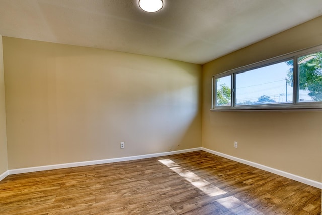 45209 Lorimer Ave, Lancaster, CA 93534 - empty room featuring baseboards and wood finished floors